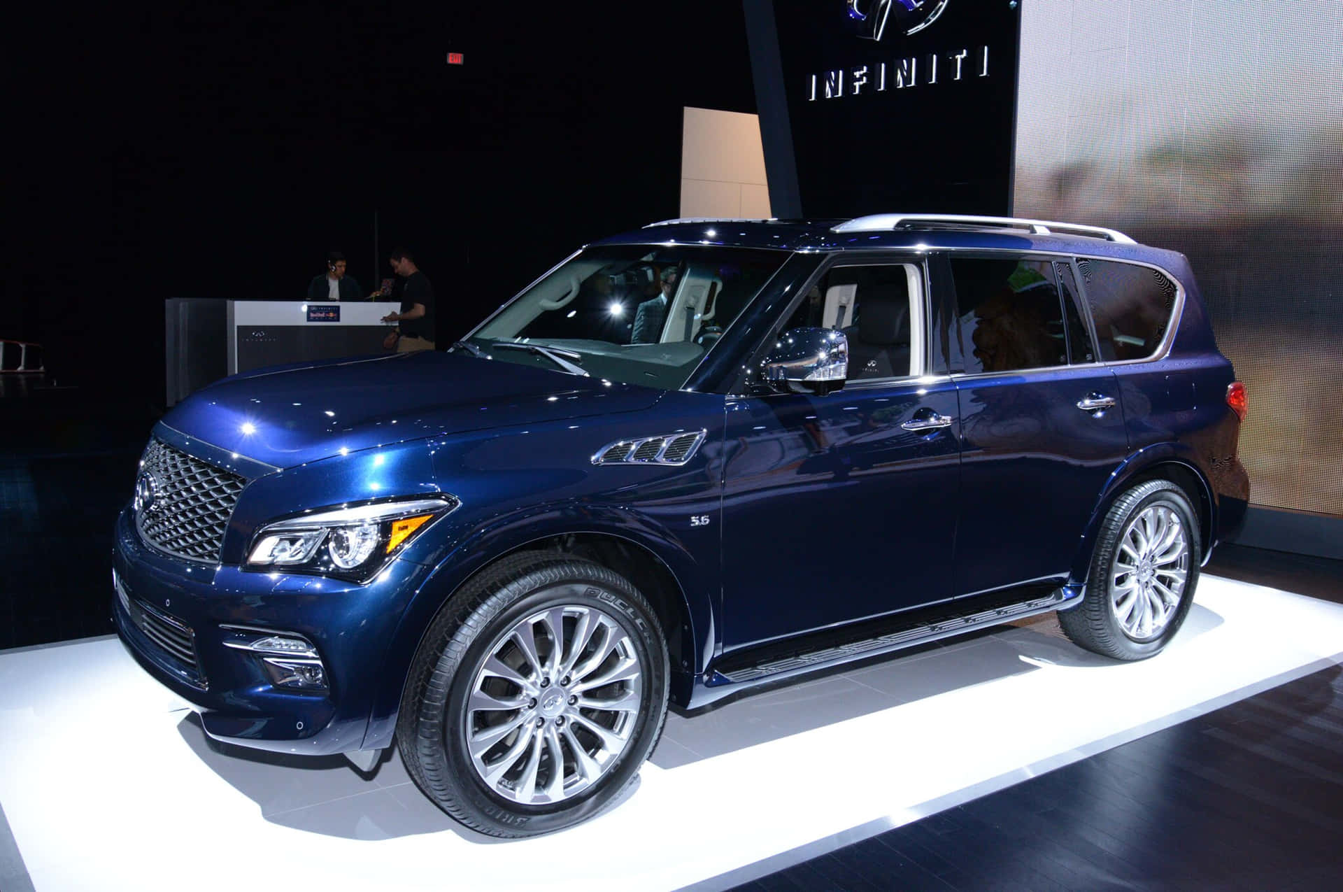 Elegant Infiniti QX80 SUV in Motion Wallpaper