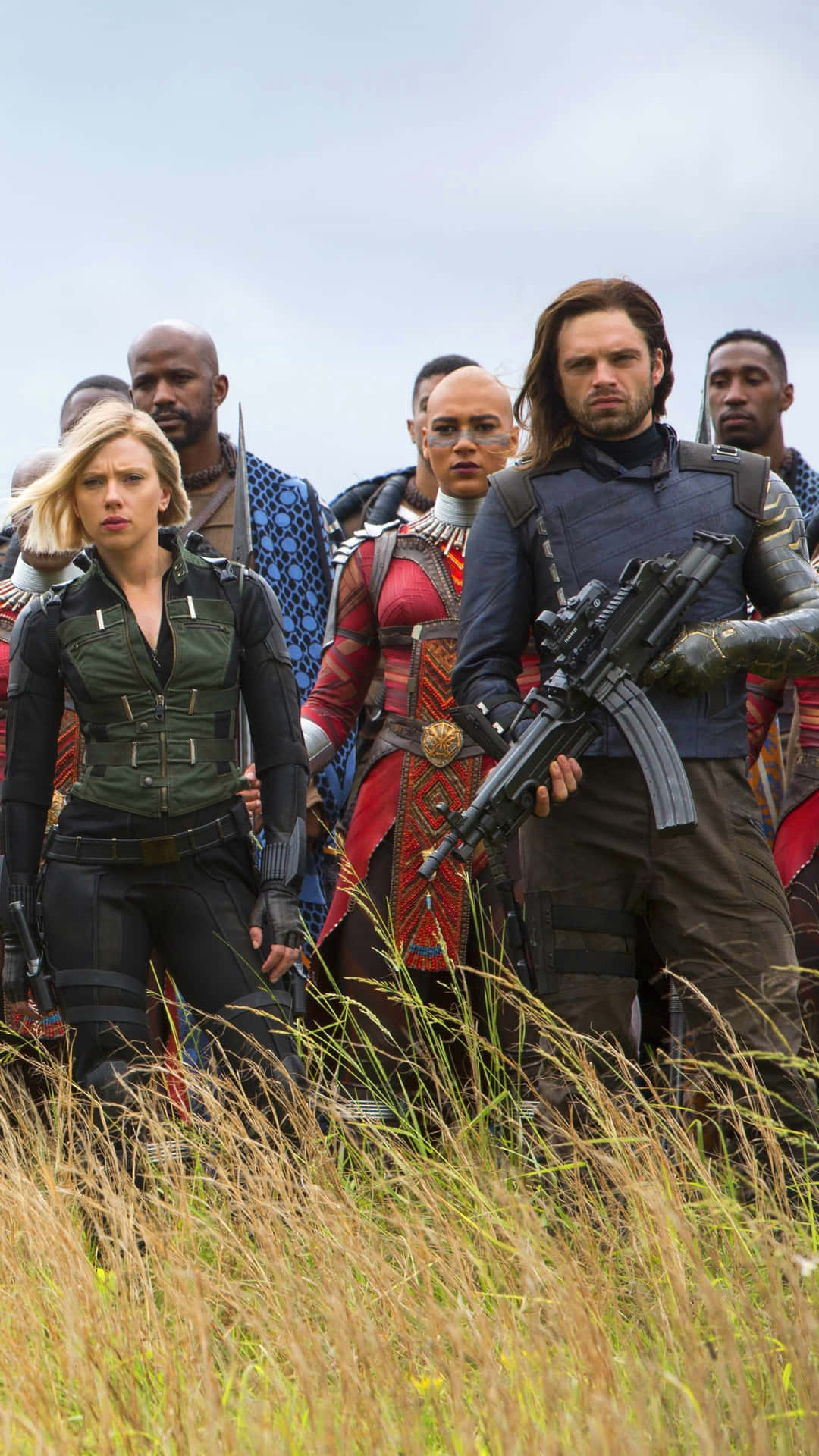 De Avengers slutter sig sammen i et episk slag mod Thanos. Wallpaper