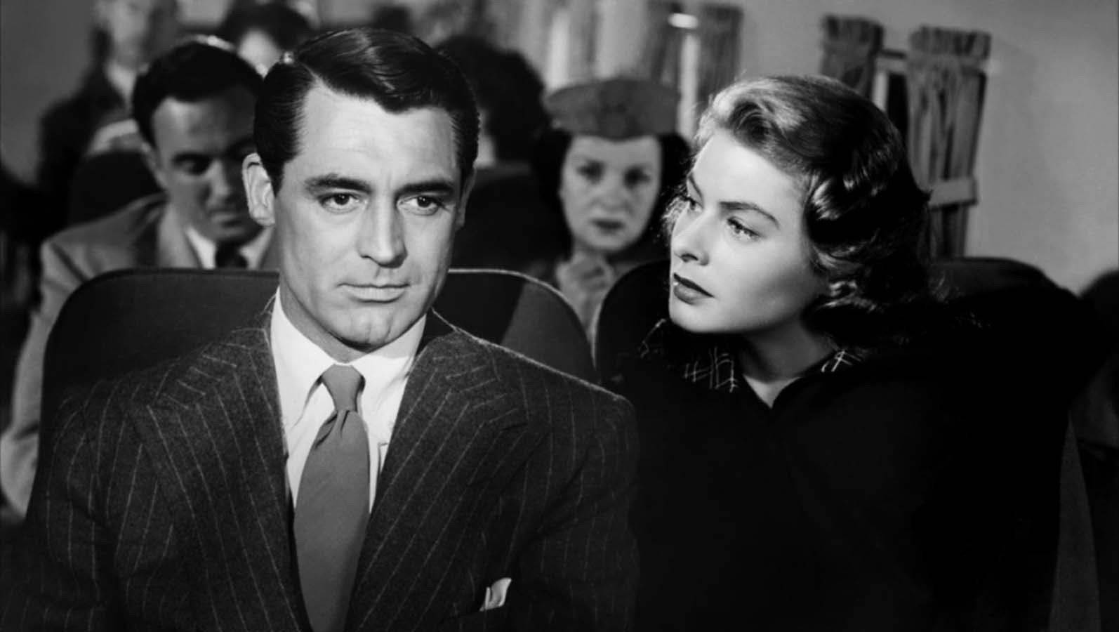 Ingridbergman E Cary Grant In Una Scena Sfondo