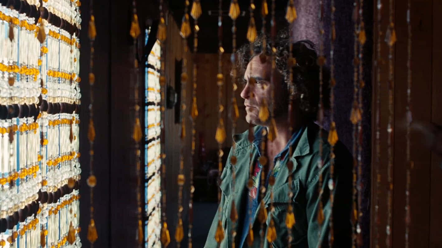 Inherent Vice Scene With Beaded Curtains Wallpaper
