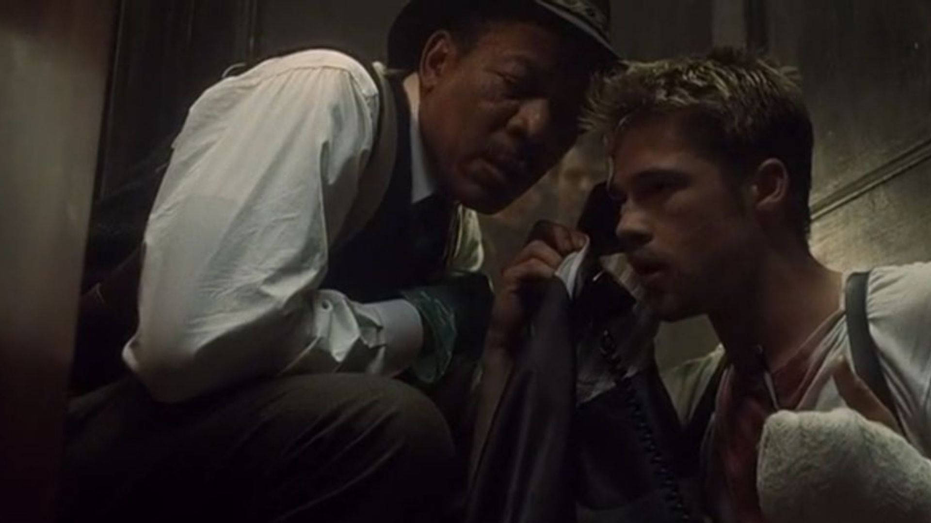 Injurerede Brad Pitt og Morgan Freeman i Rummet Wallpaper