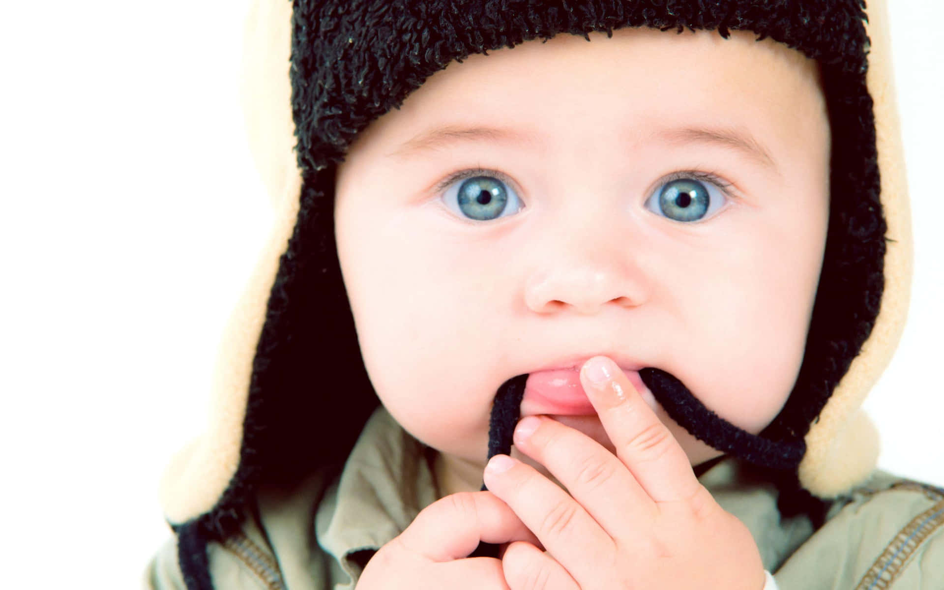 "innocence And Wonder: Close-up Portrait Of A Cute Baby"
