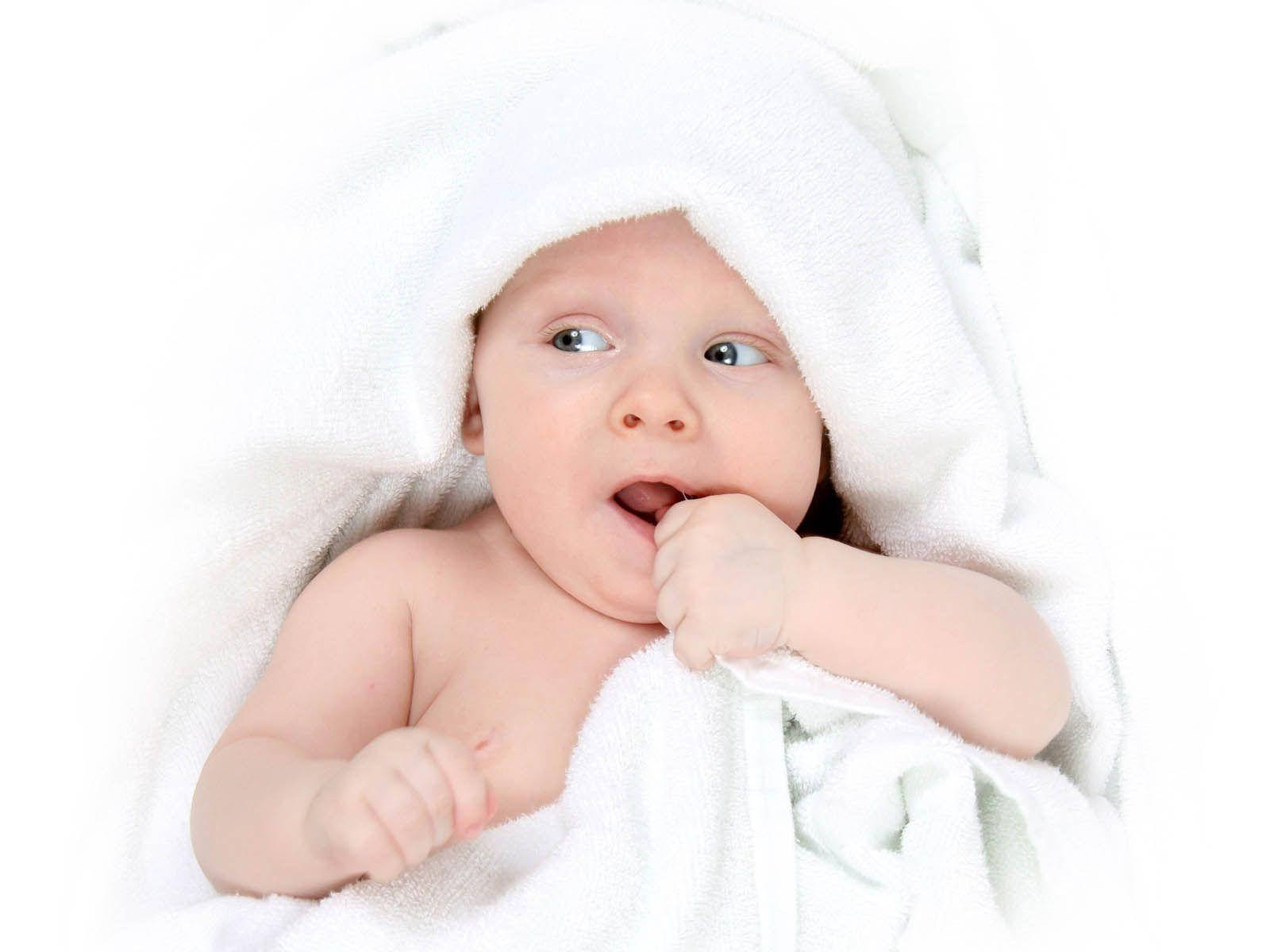 Innocence Expressed - Adorable Newborn Close-up Wallpaper