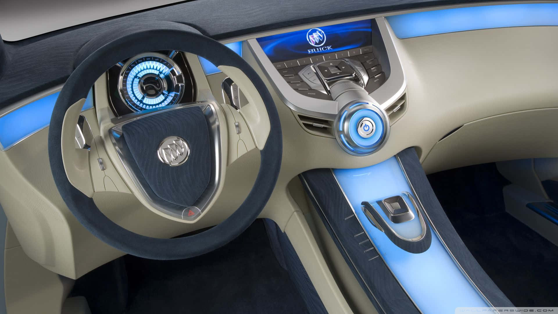 En futuristisk bil med blå lys og et instrumentbræt af hologrammer Wallpaper