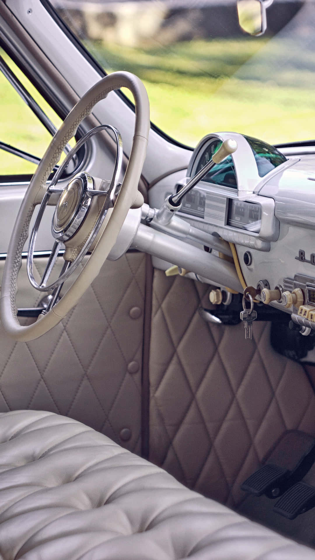 A Classic Car With A Leather Interior Wallpaper