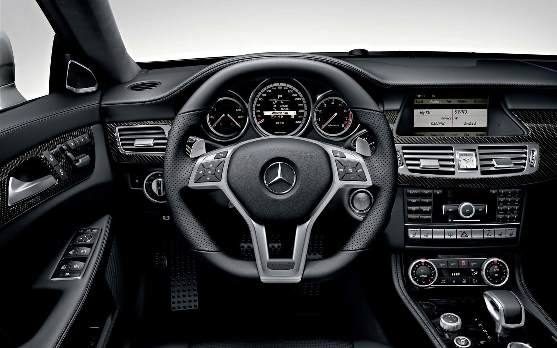 Enjoy the sophisticated interior and amenities of this car Wallpaper