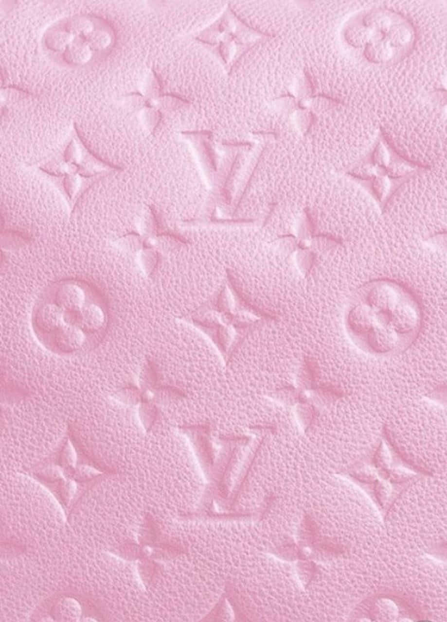 Enlyserød Louis Vuitton Taske Med En Lyserød Logo. Wallpaper