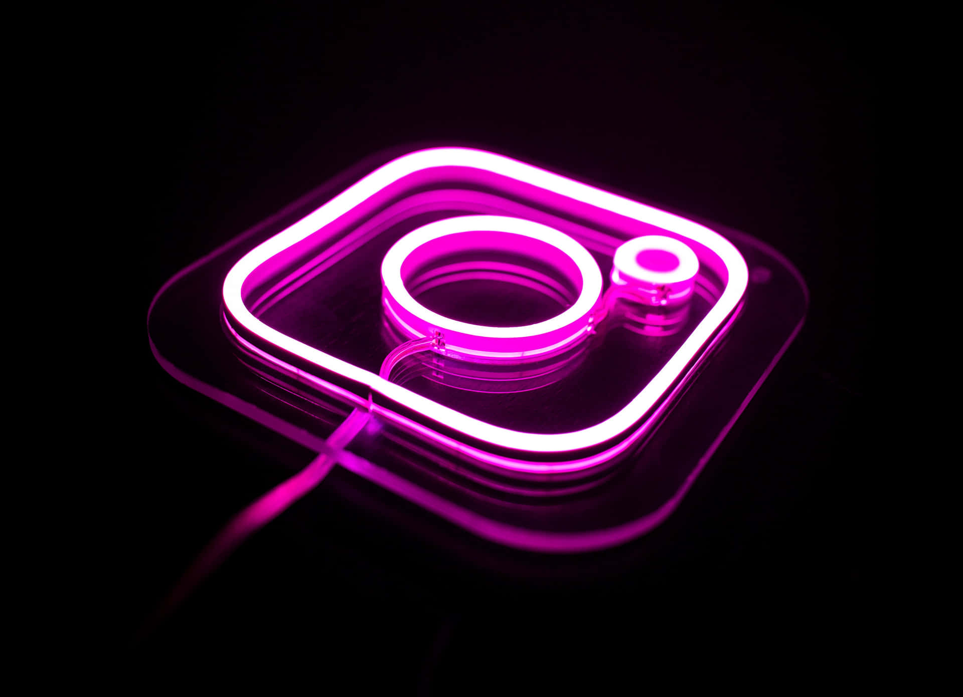 Instagram Neon Pink Logo Black Background