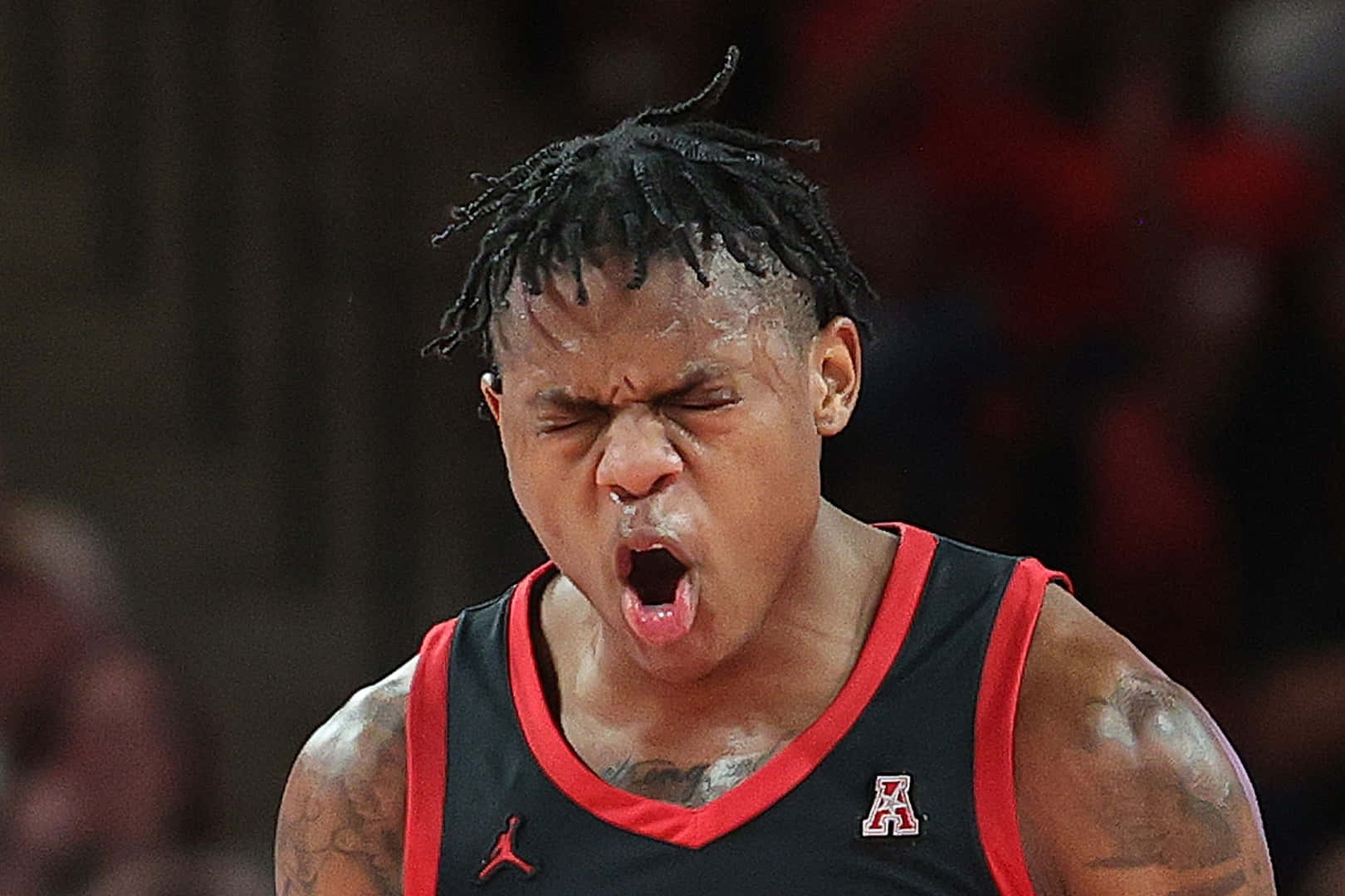 Intense Basketball Player Emotion Wallpaper
