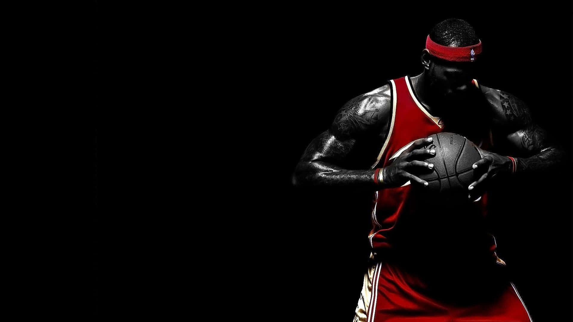 Intense Basketball Player Red Black Wallpaper