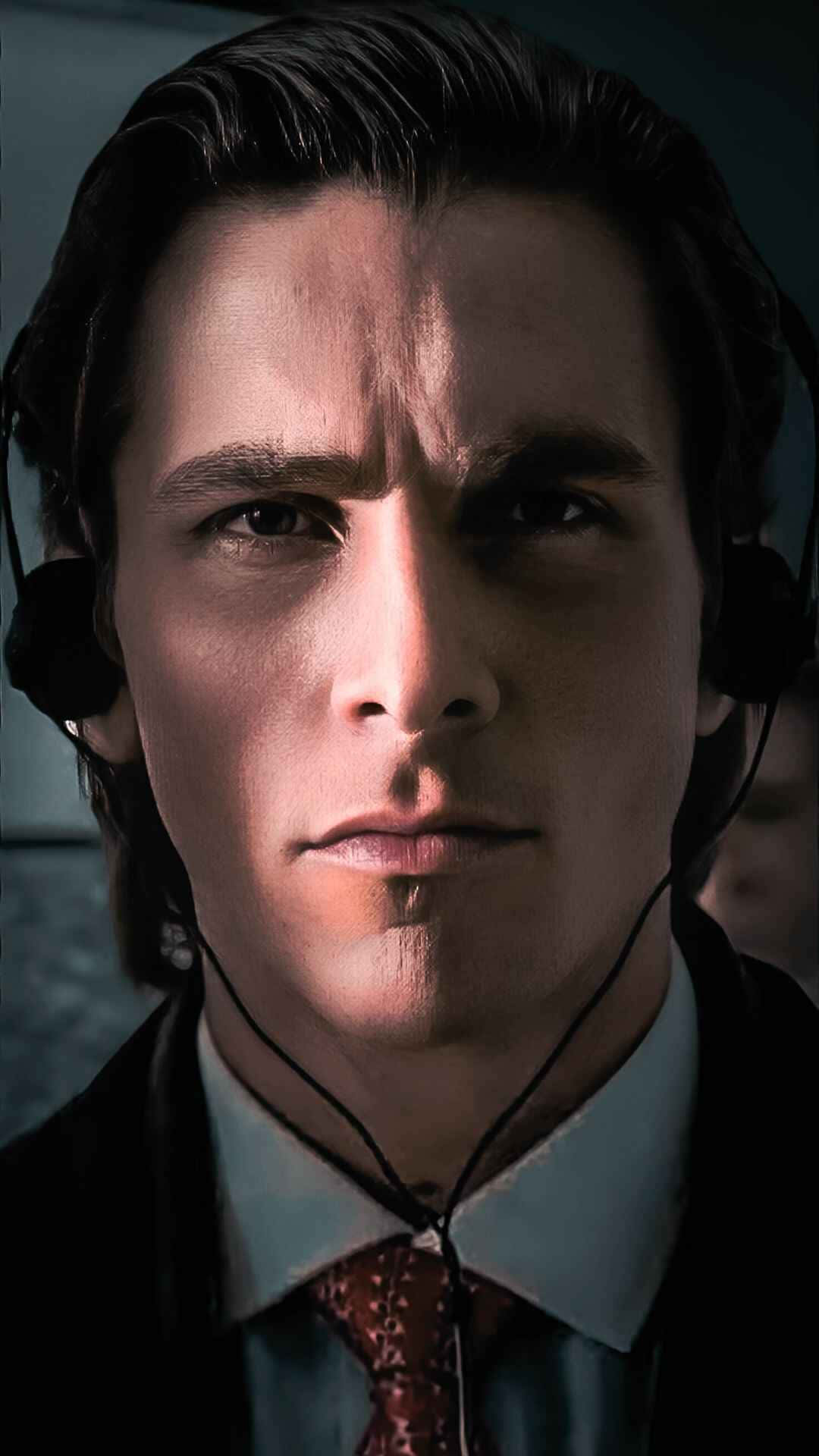 Intense Businessman Headphones Wallpaper