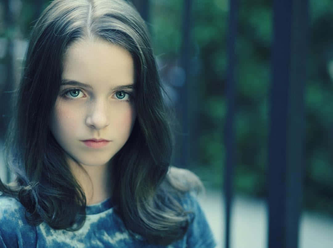 Intense Gaze Young Actress Wallpaper