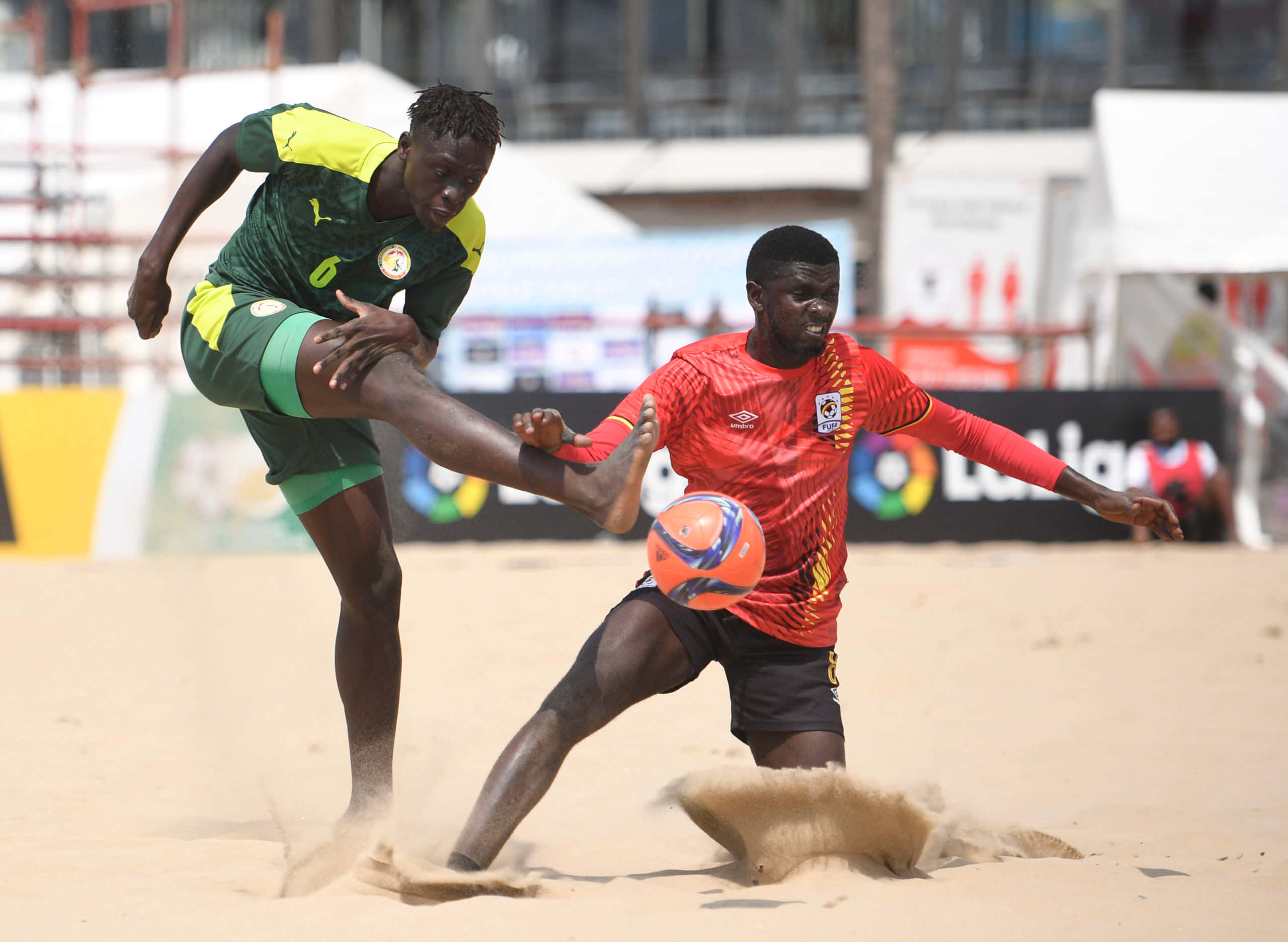 Intense Moment In A Beach Soccer Match Wallpaper