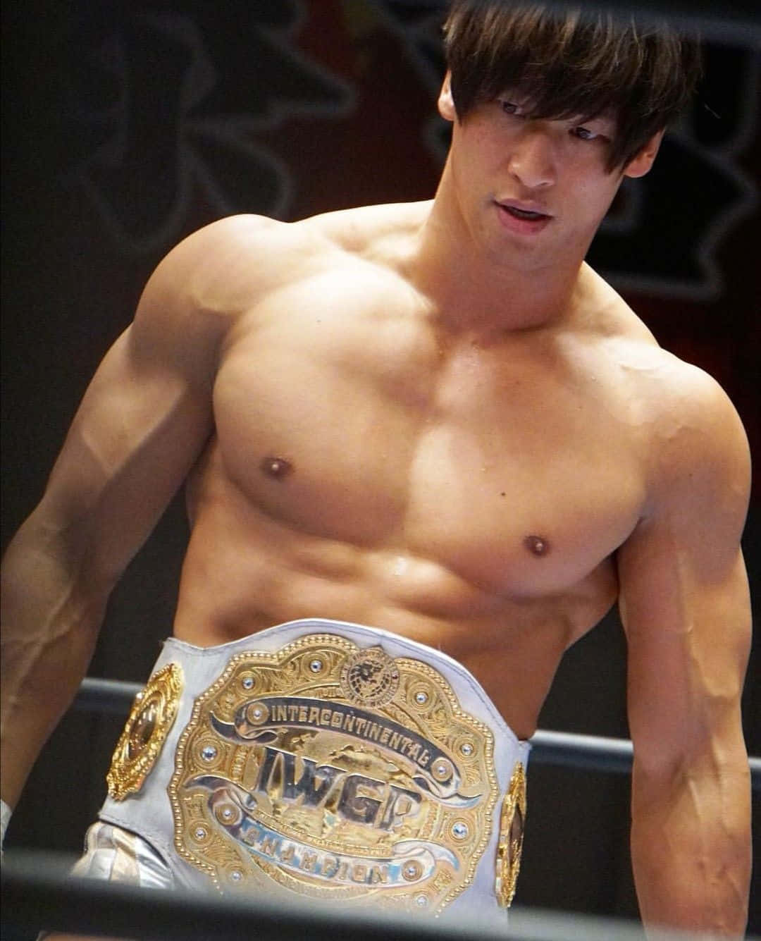 "Intercontinental Champion Kota Ibushi holding his championship belt" Wallpaper