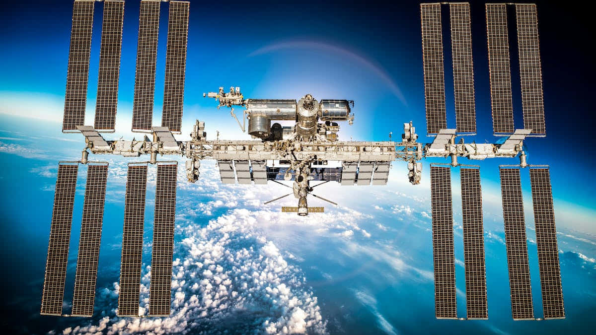 The International Space Station orbits Earth Wallpaper