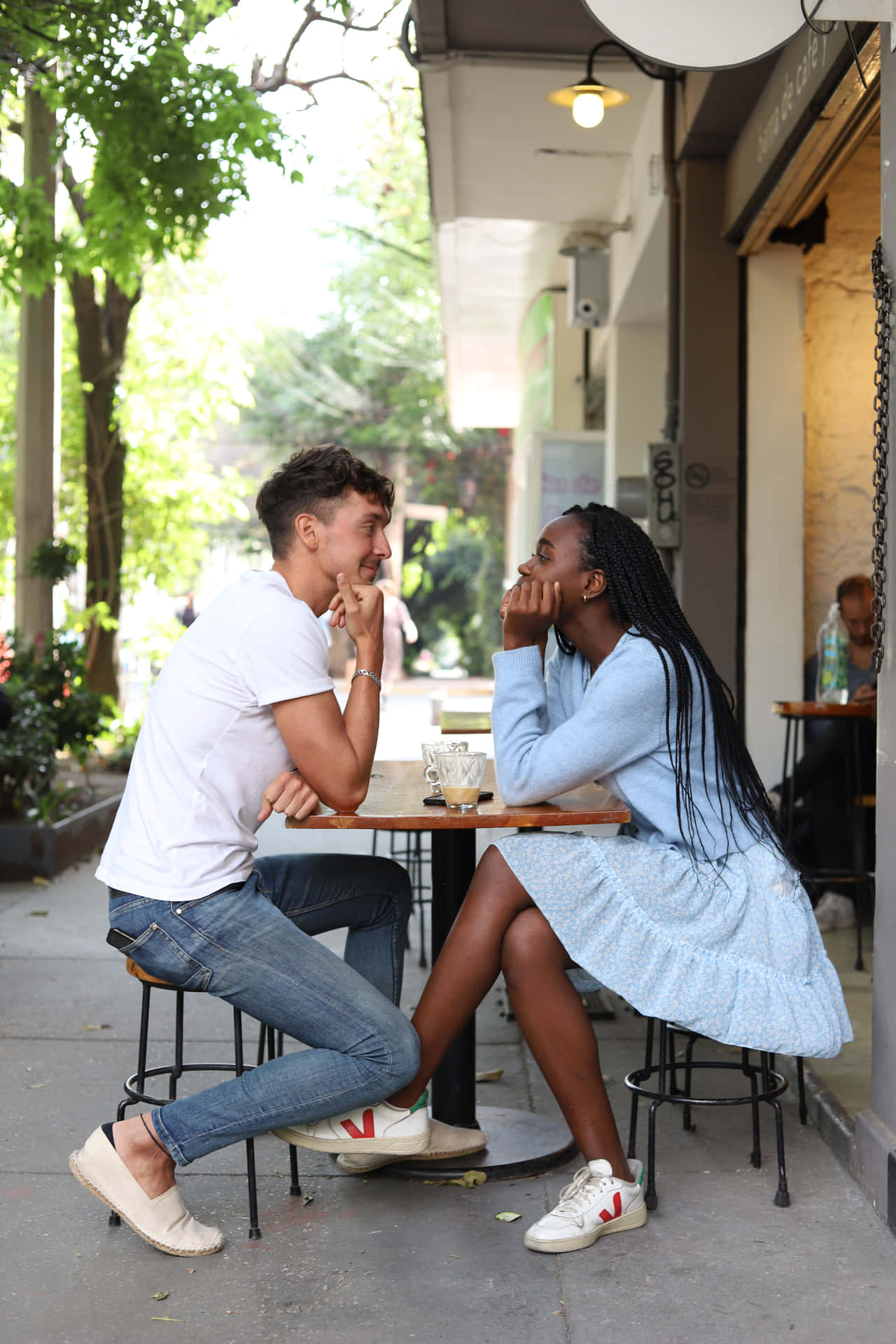 Interracial Couple On Cafe Date Wallpaper