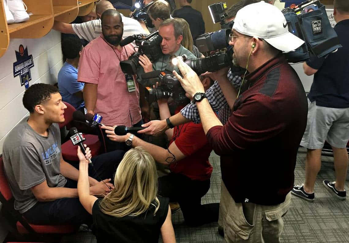 Interview Locker Room With Reporters Picture