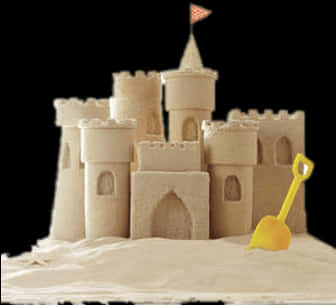 Intricate Sand Castlewith Shovel PNG