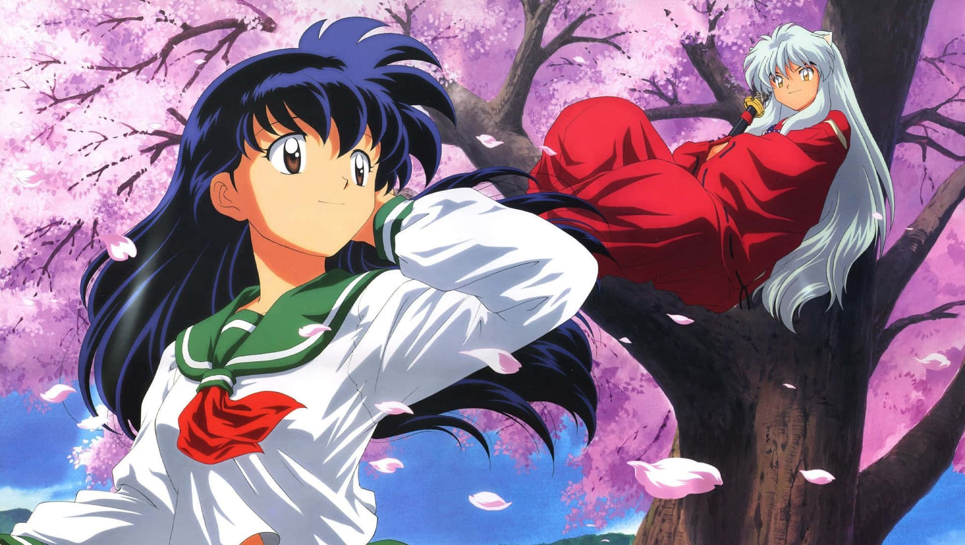 Inuyasha and Kagome embracing each other in a magical forest Wallpaper