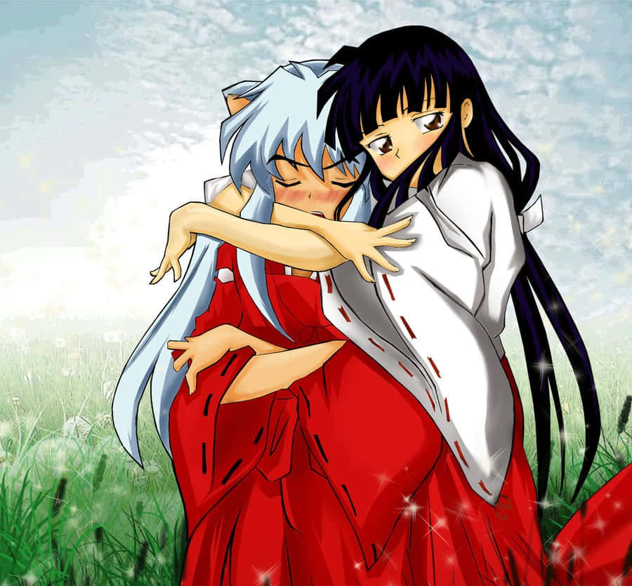 Inuyasha and Kikyo sharing a heartfelt moment Wallpaper