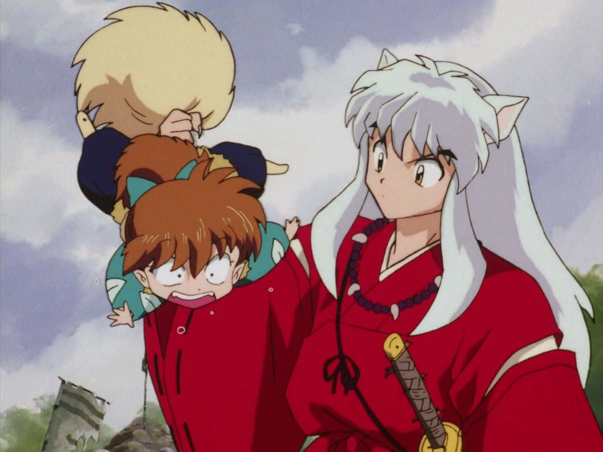 Inuyasha and Shippo bonding in the mystical forest Wallpaper
