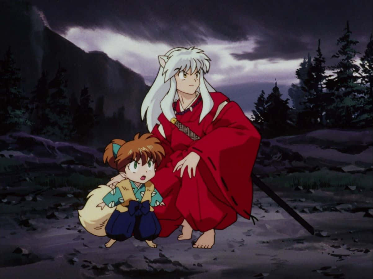 Inuyasha and Shippo in a Heartwarming Moment Wallpaper