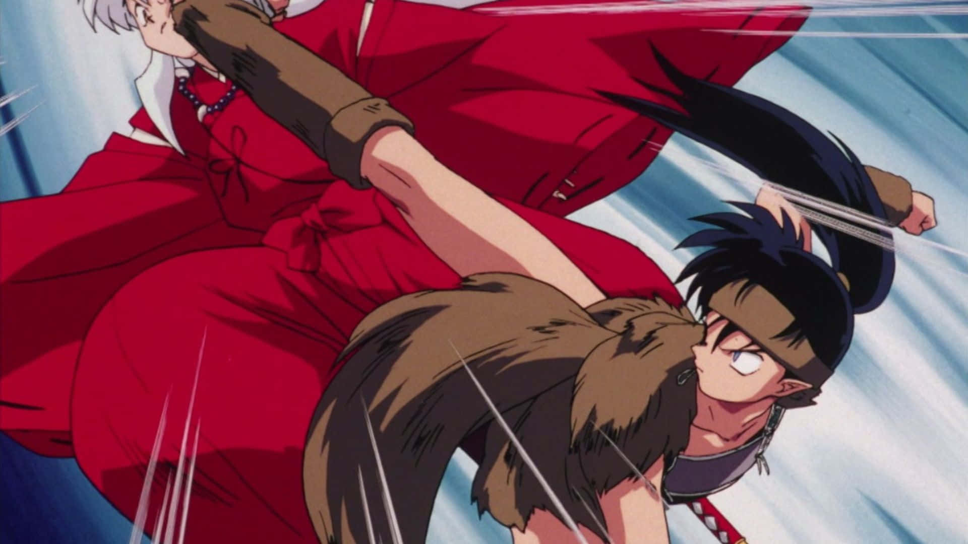 Inuyasha and Koga face off in a tense moment Wallpaper