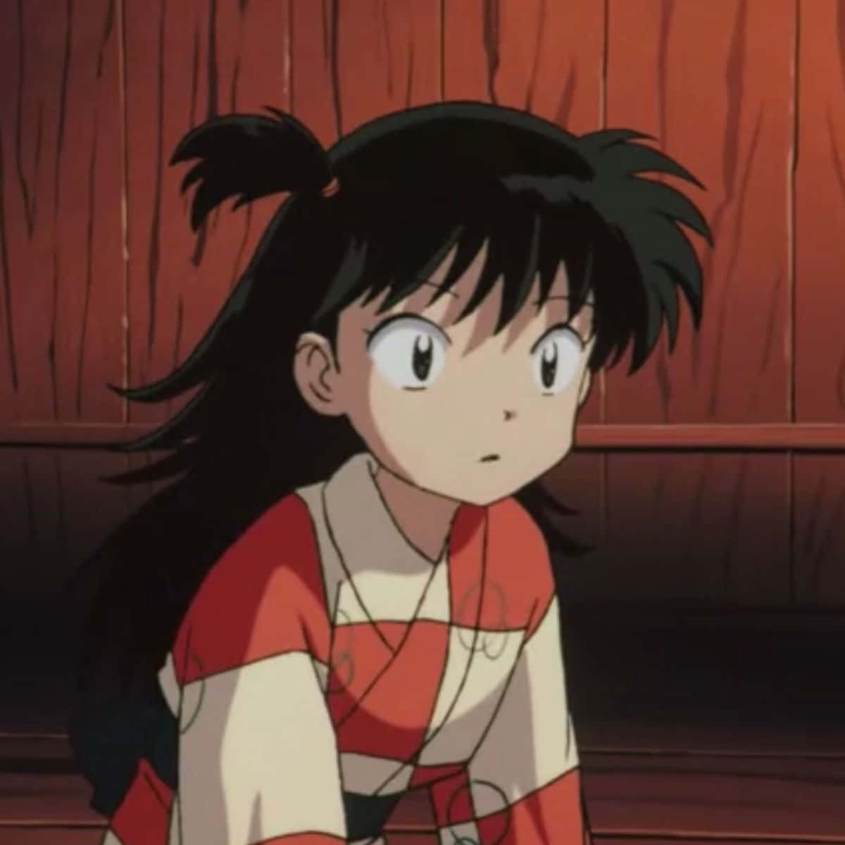 Rin from Inuyasha posing in a vibrant and colorful scene. Wallpaper