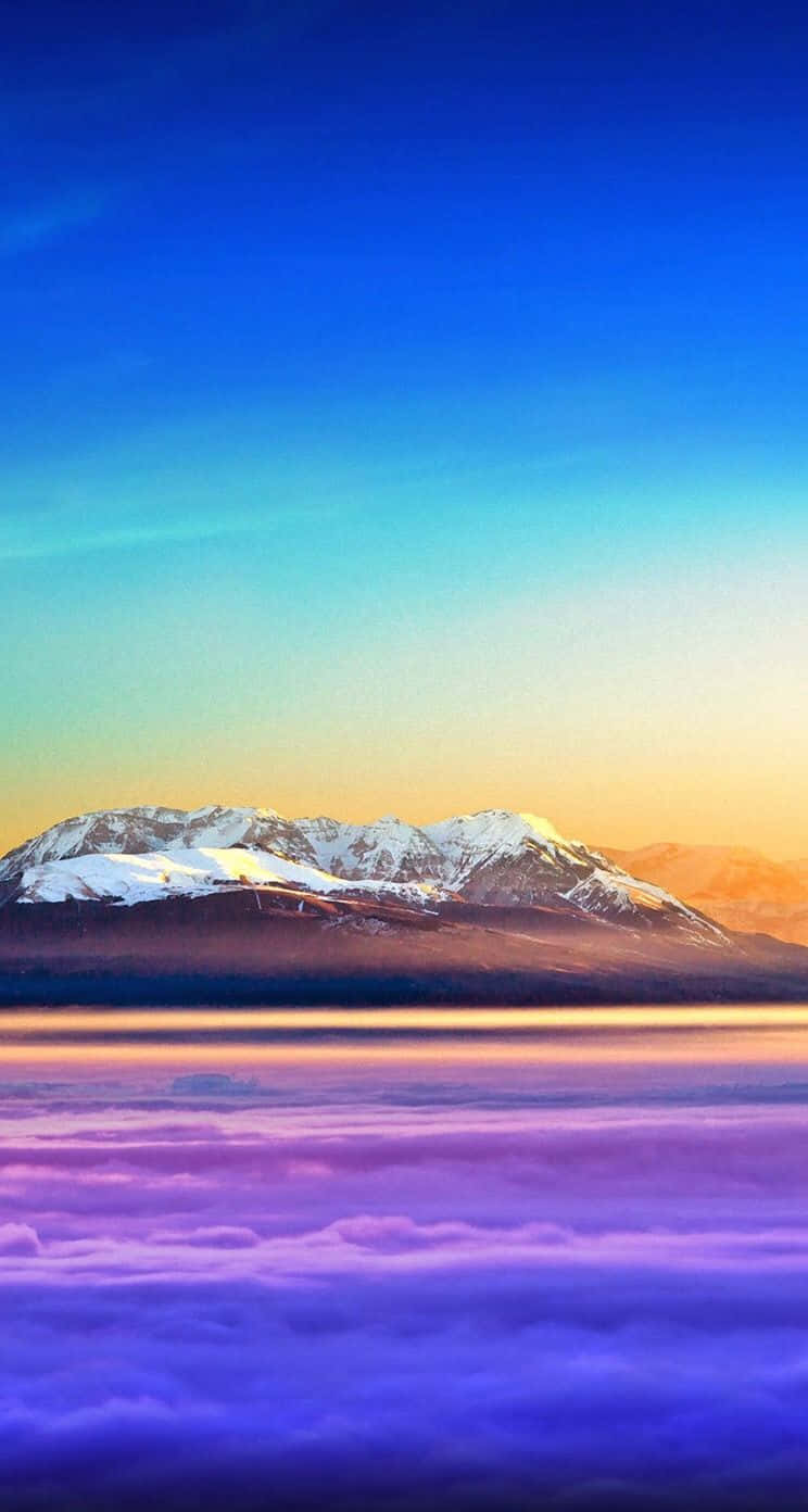 Ios1 Montaña Colorida Sobre El Cielo Fondo de pantalla