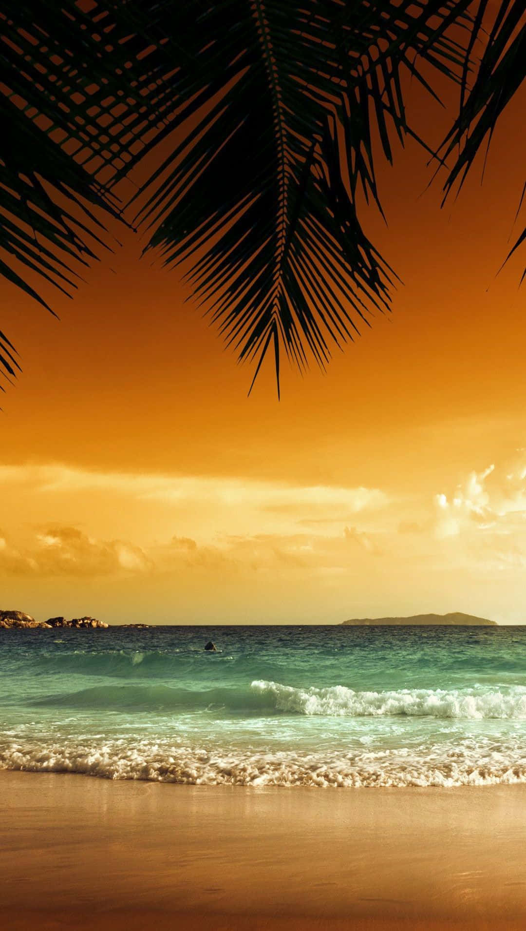 Puestade Sol En La Playa En Ios. Fondo de pantalla