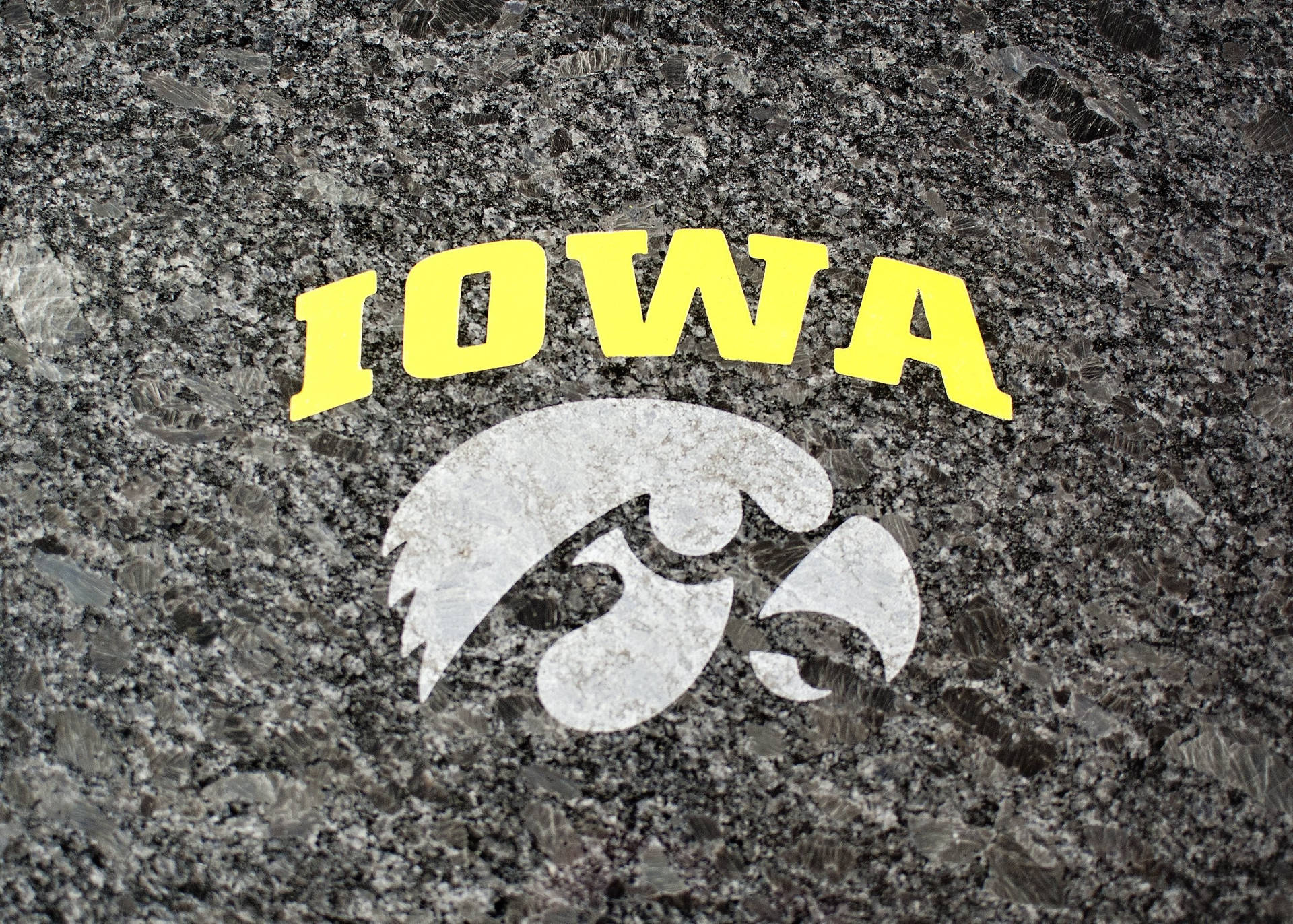 The irresistible strength of the Iowa Hawkeyes captured in a striking image. Wallpaper