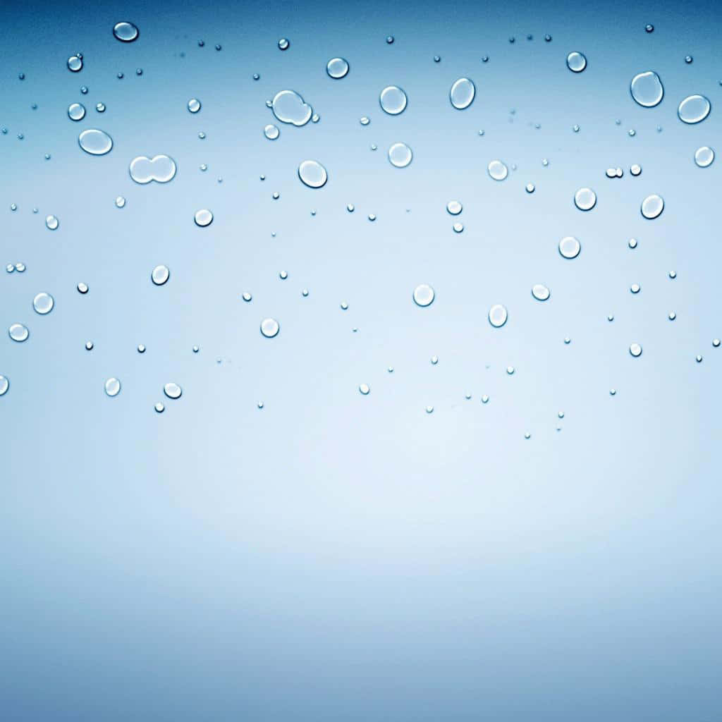 Gotasde Agua Sobre Un Fondo Azul Fondo de pantalla