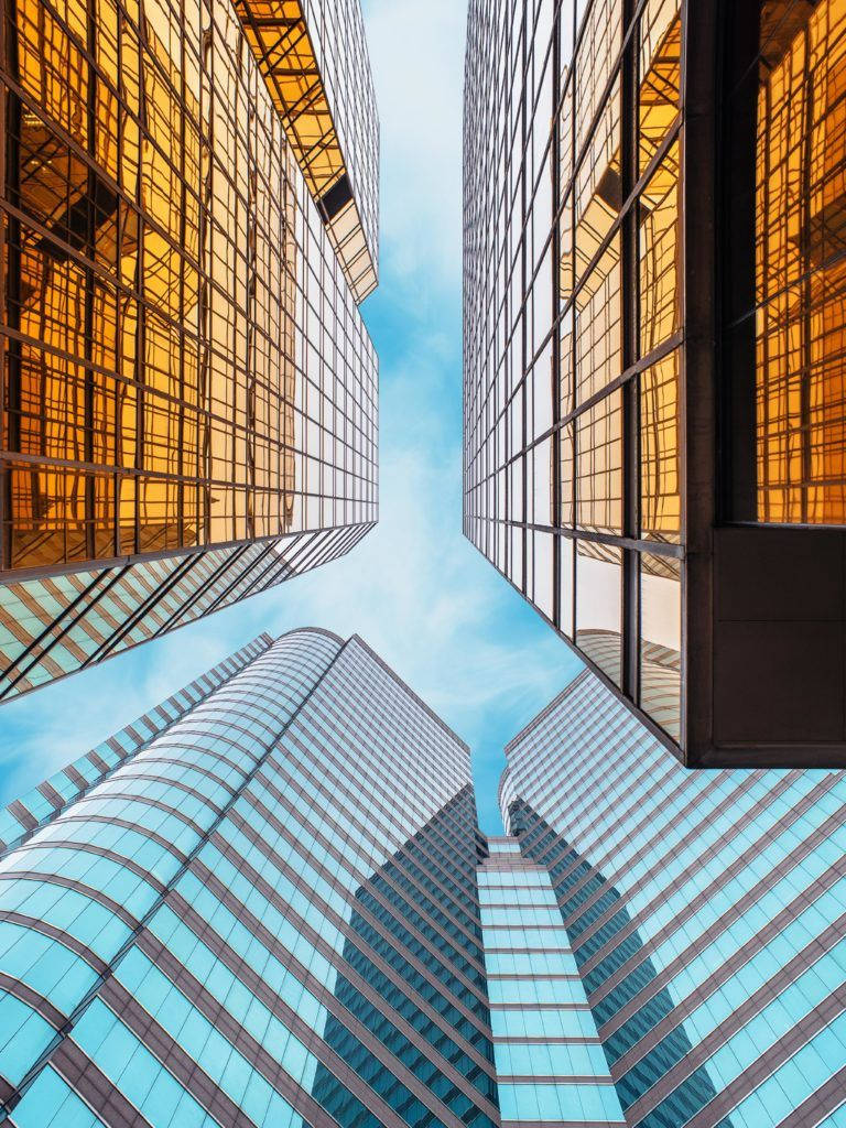 Ipad Pro Upward View Of Buildings Wallpaper