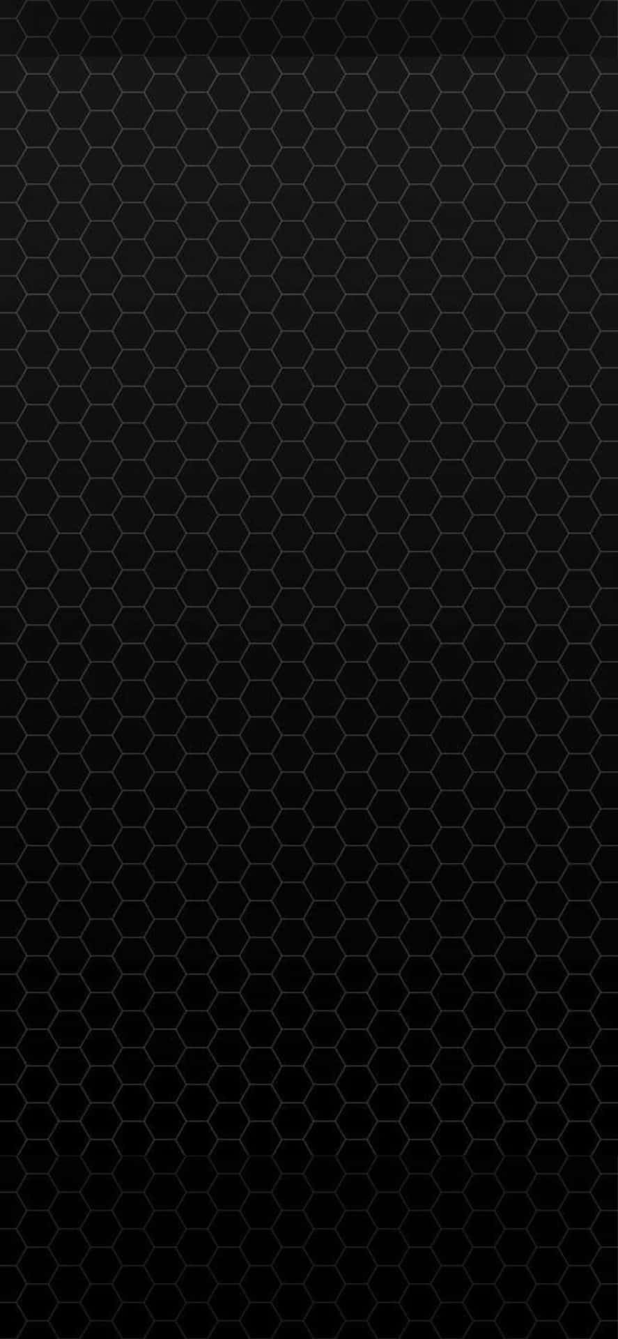 A Black Hexagonal Pattern On A Black Background