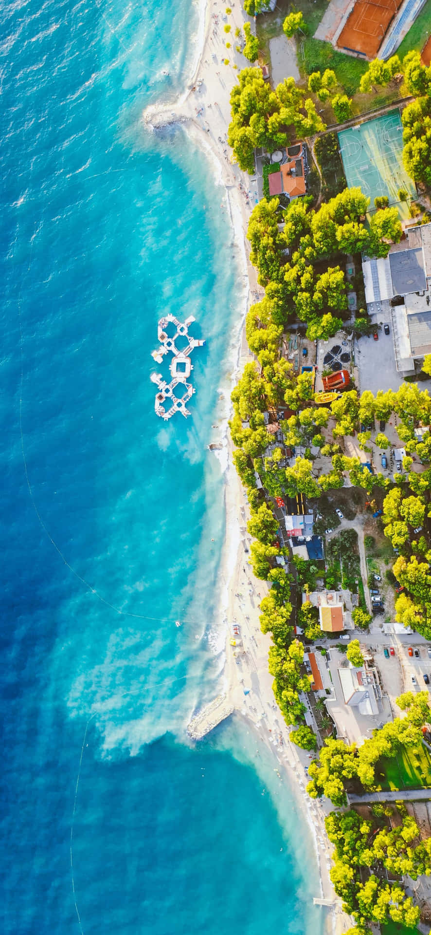 Toma Aérea De Playa Con Iphone 16 Plus Fondo de pantalla