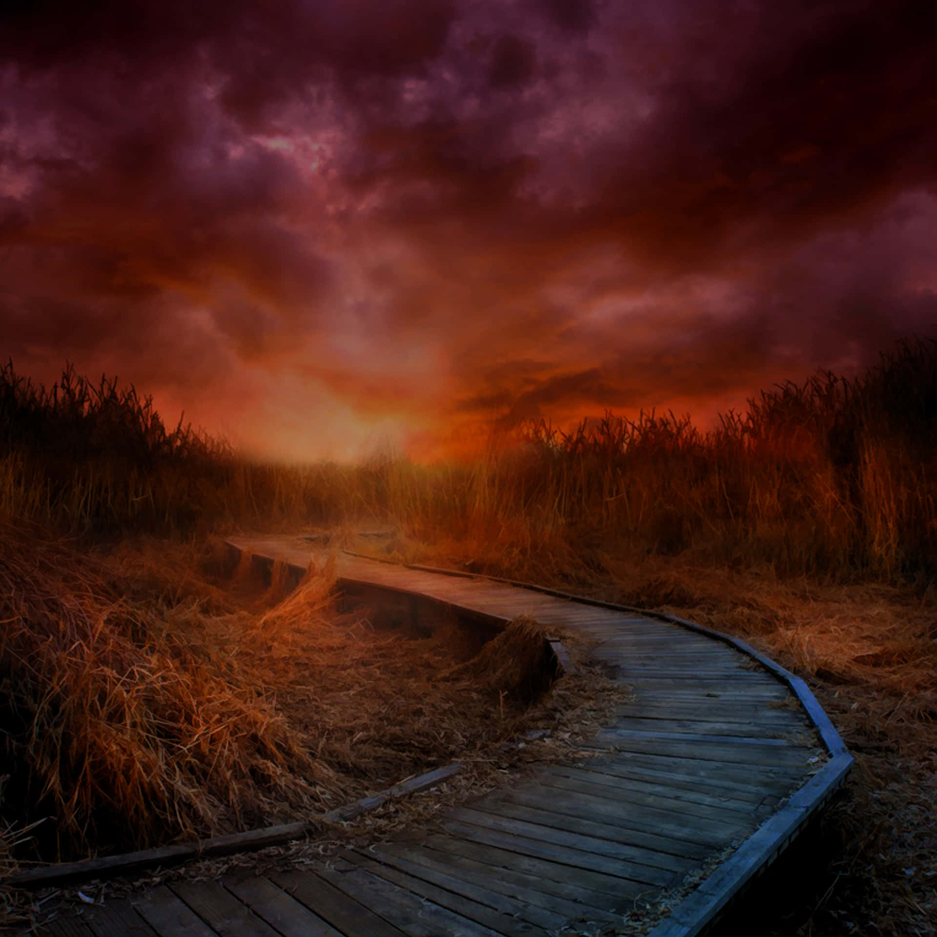 A Wooden Walkway Leading To A Dark Sky Wallpaper