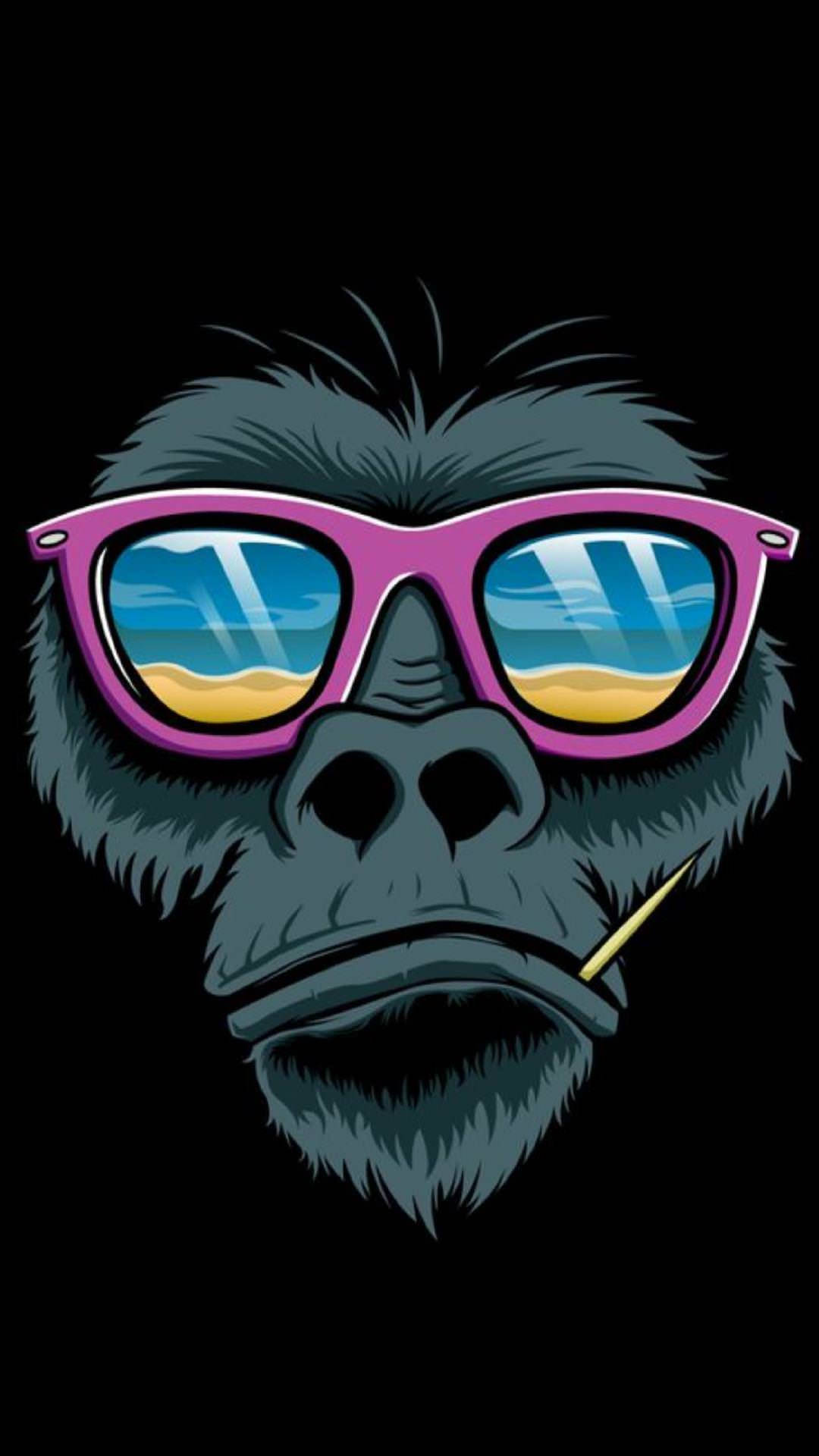 En gorilla iført solbriller og en cigaret. Wallpaper