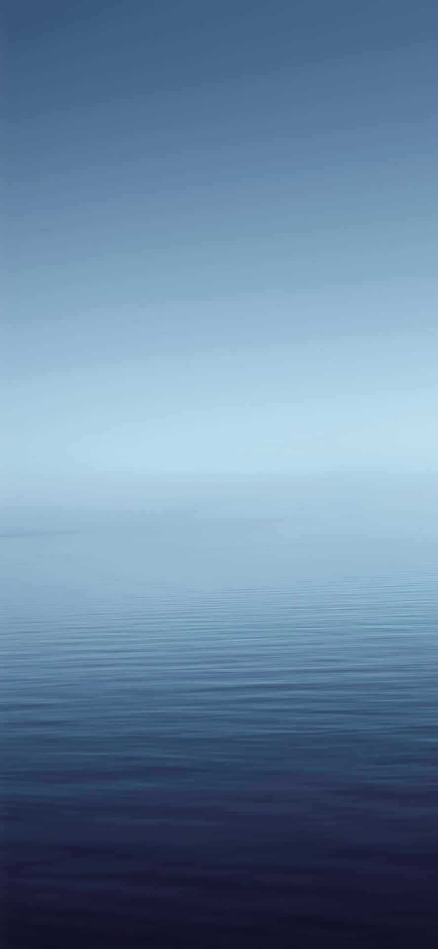 A Blue Ocean With A White Horizon Wallpaper