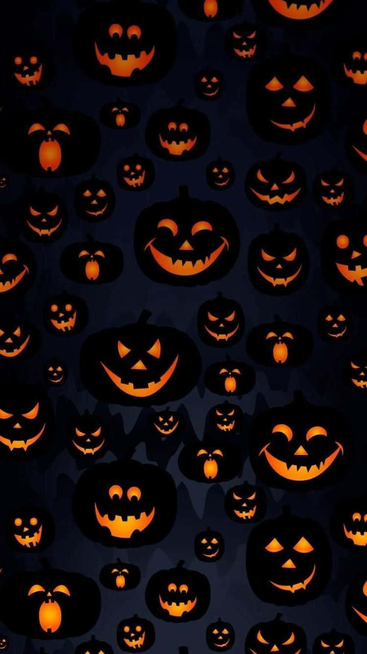 Have a spooktacular Halloween with this super cute iPhone wallpaper