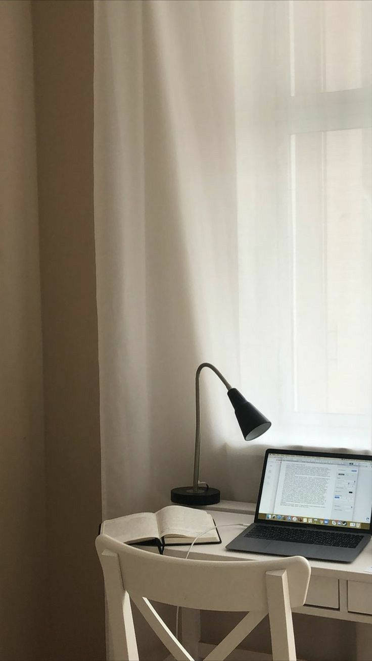 Iphone Desk With White Chair Wallpaper