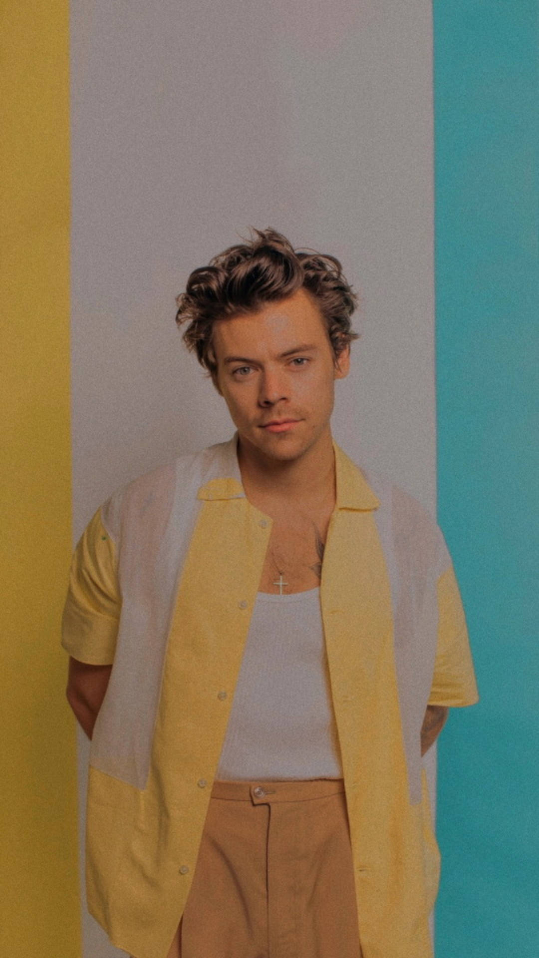 Iphone Harry Styles In A Yellow Polo Wallpaper