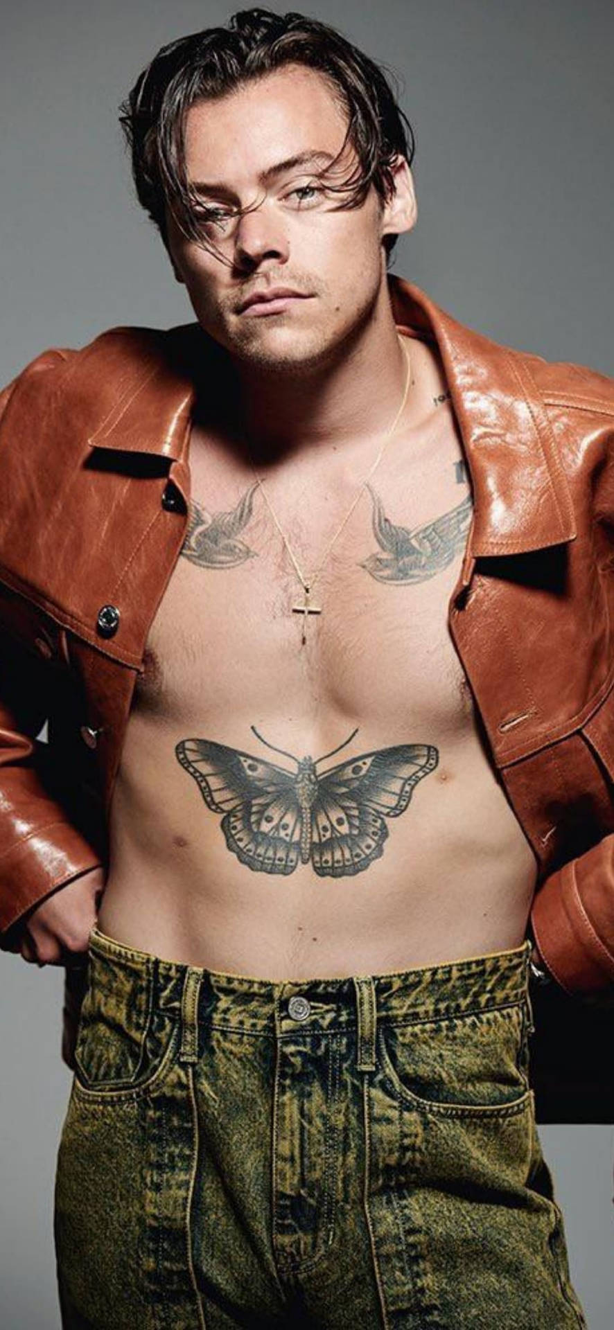 Iphone Harry Styles With Butterfly Tattoo Wallpaper