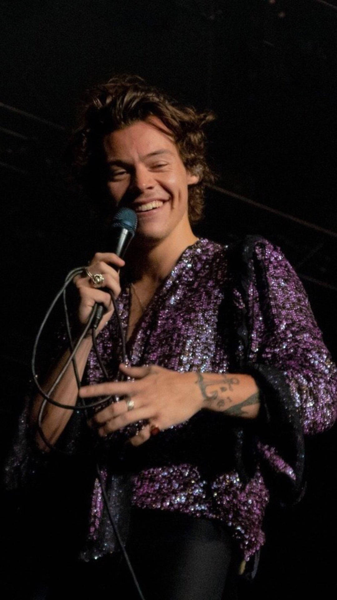 Harry Styles in the Spotlight with an Iphone Wallpaper
