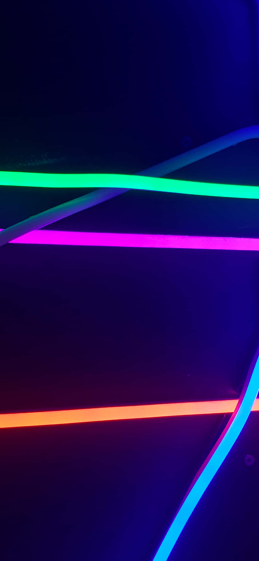 Download Neon Light Lines On A Dark Background | Wallpapers.com