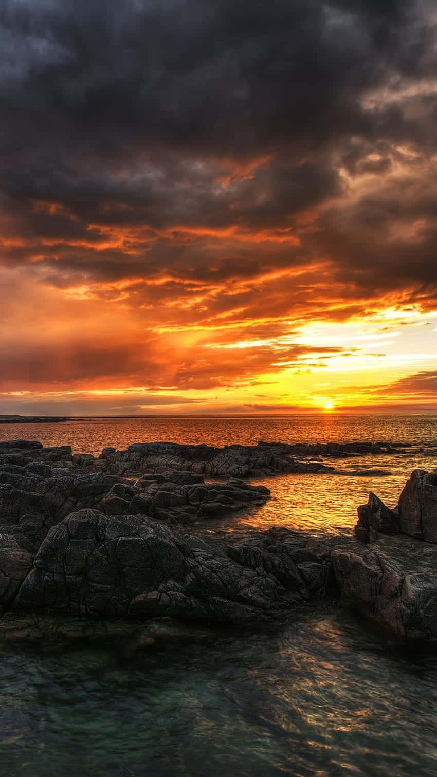 Iphone X Malibu baggrund Stormy Sunset Sky