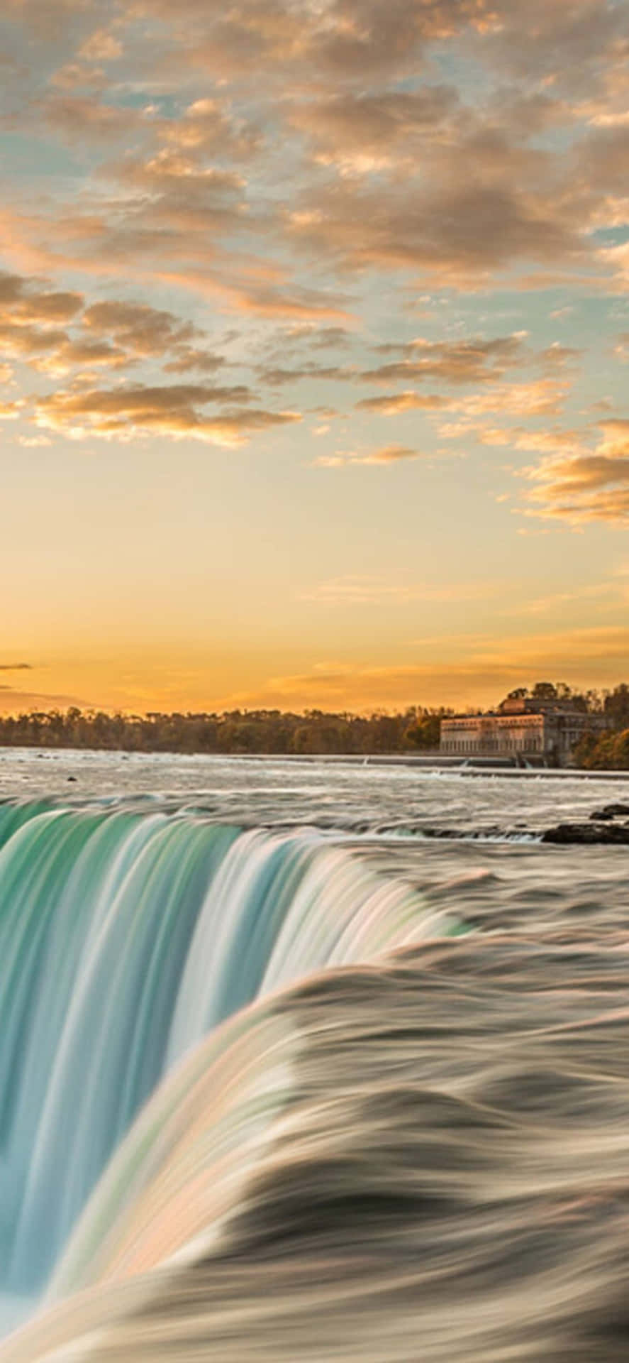 Iphonex Bakgrund Med Niagarafallen Vid Solnedgången.