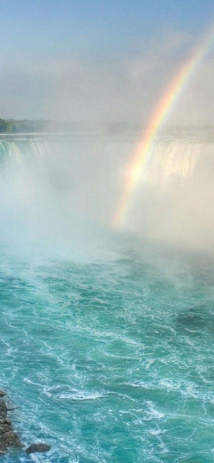 Iphonex Bakgrundsbild Av Regnbågen Vid Niagara Fallen.
