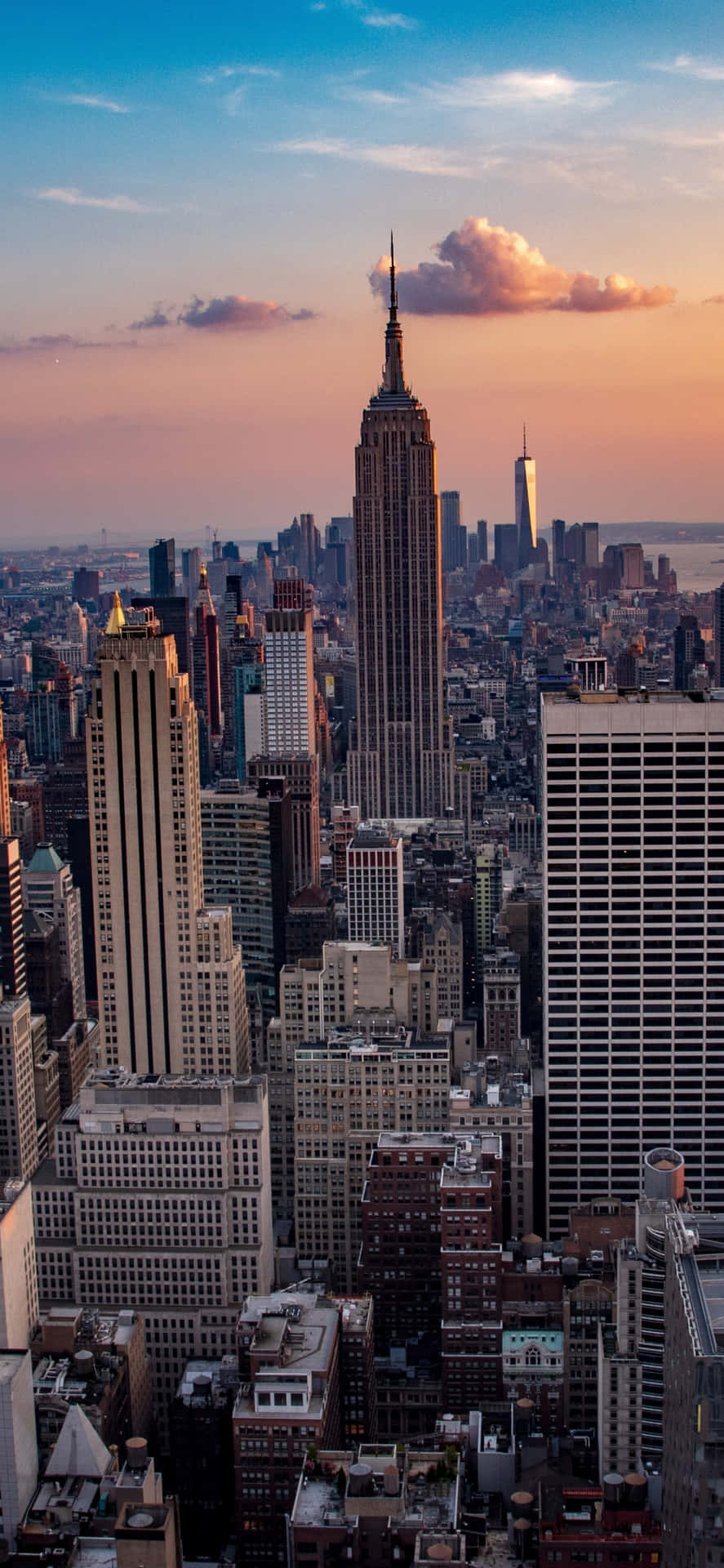 Iphonex Bakgrundsbild Med New York City Empire State Vid Solnedgången.