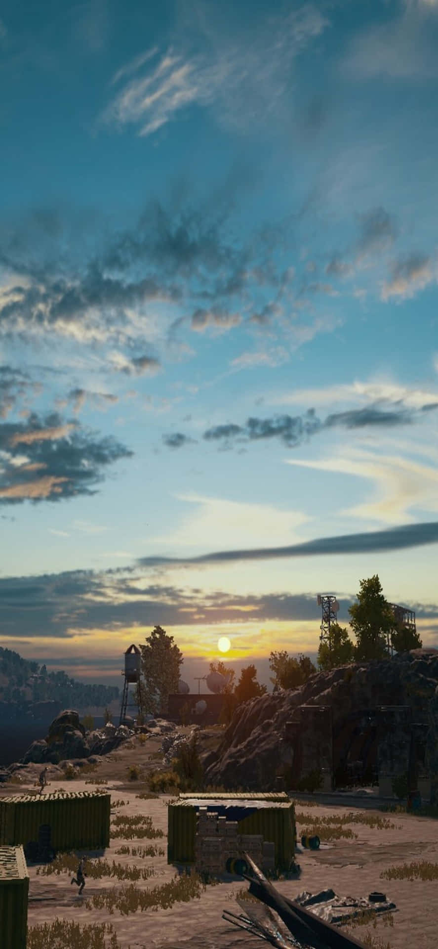 a screenshot of a desert scene with a sunset