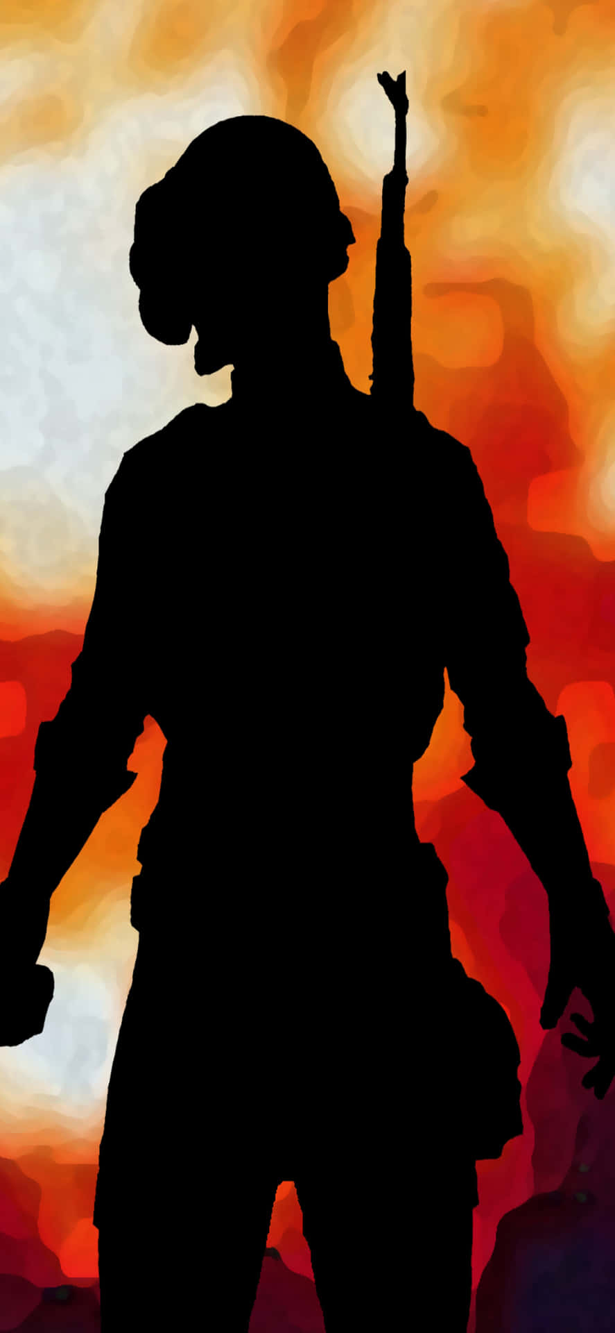 a silhouette of a soldier with a gun in front of a sunset